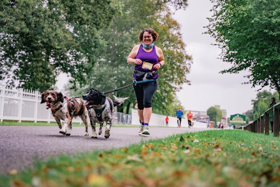 Jessie May runner, Gayle Lui running with her spaniels at Cairnicross